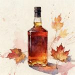 A bottle of bourbon next to few dried maple leaves