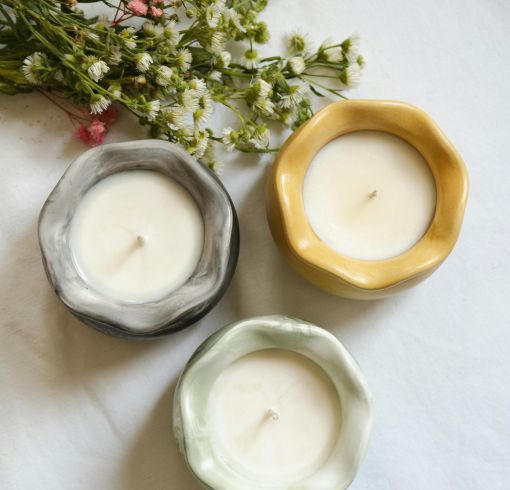 3 bougies en contenant vue de dessus